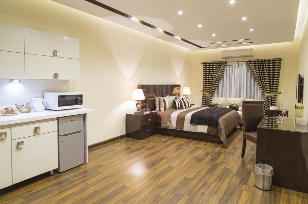 โรยอเต ลักชัวรี Hotel ลาฮอร์ ห้อง รูปภาพ