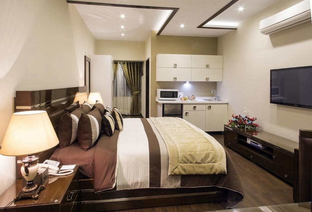 โรยอเต ลักชัวรี Hotel ลาฮอร์ ห้อง รูปภาพ