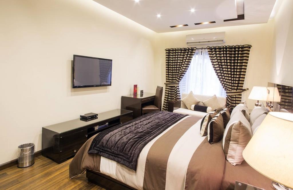 โรยอเต ลักชัวรี Hotel ลาฮอร์ ห้อง รูปภาพ