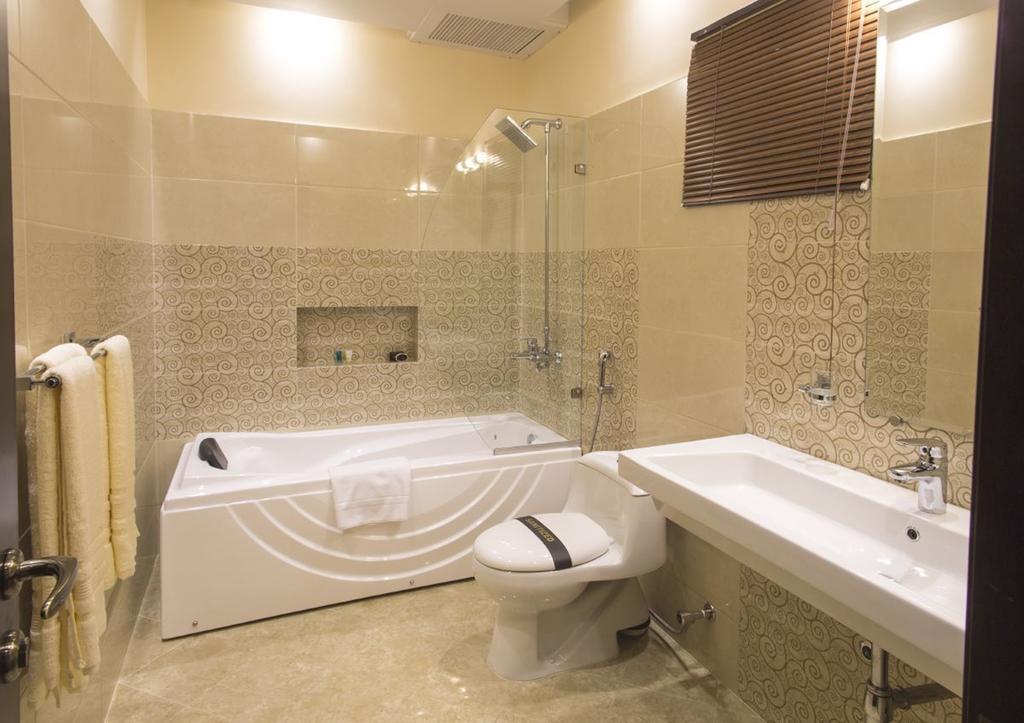 โรยอเต ลักชัวรี Hotel ลาฮอร์ ห้อง รูปภาพ
