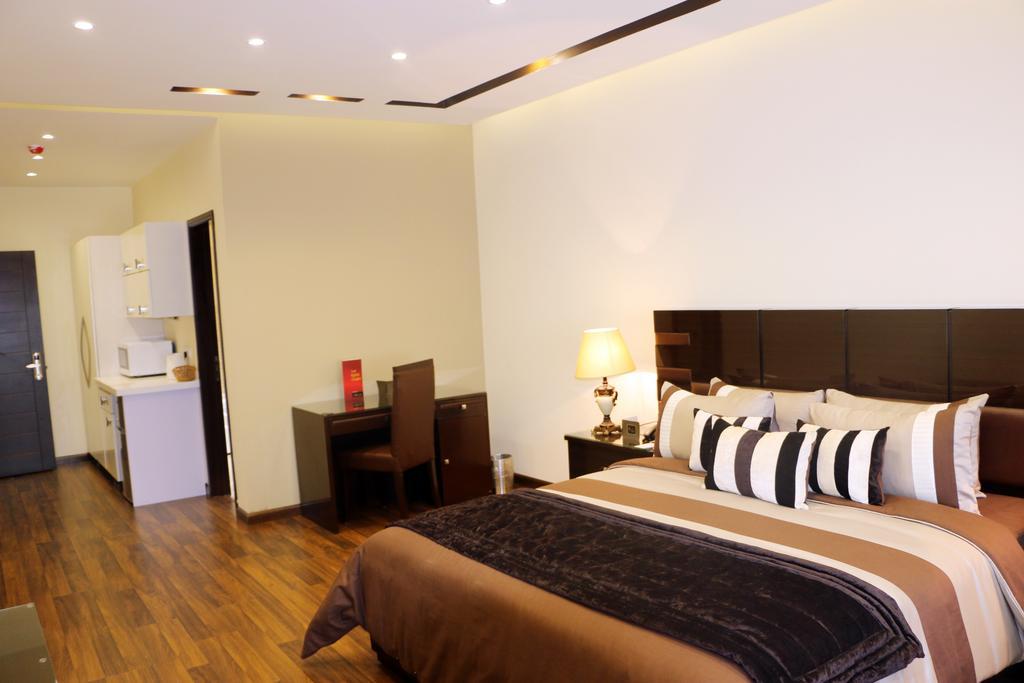 โรยอเต ลักชัวรี Hotel ลาฮอร์ ห้อง รูปภาพ